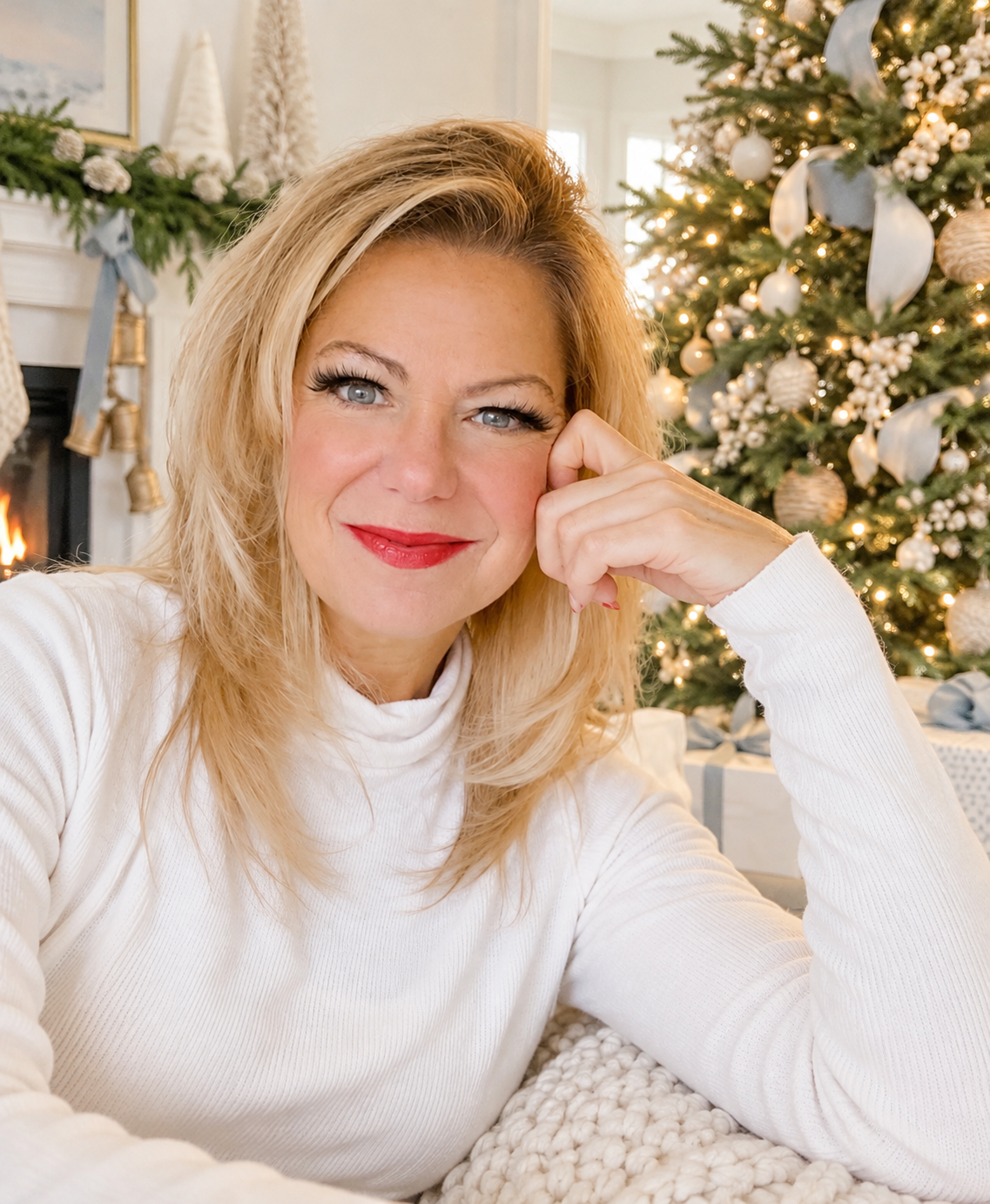 The founder of The Gifted Elf beside a styled Christmas tree